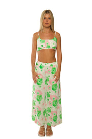 Green, pink and white linen pants with floral pattern made for women.