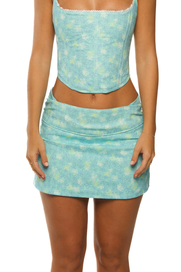 Blue linen mini skirt with floral pattern made for women.